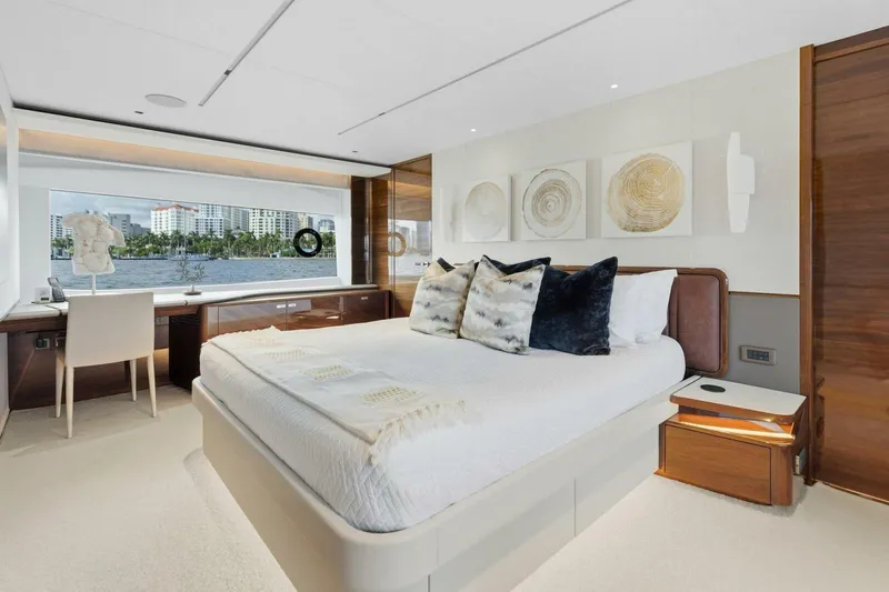 Lady Lion Yacht Photos Pics Luxurious bedroom interior of 2023 Princess X95 yacht with waterfront view.