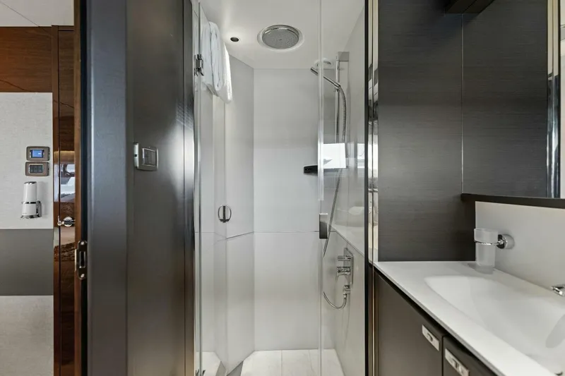 Lady Lion Yacht Photos Pics Luxurious bathroom in 2023 Princess X95 yacht, featuring modern shower and sleek design.