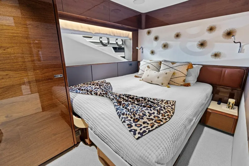 Lady Lion Yacht Photos Pics Luxurious 2023 Princess X95 yacht bedroom with elegant decor and modern design.