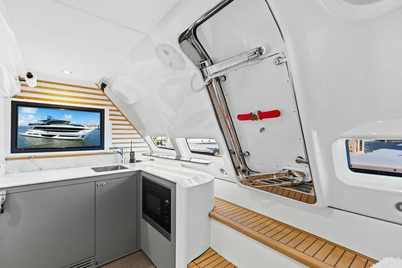 Lady Lion Yacht Photos Pics Interior of 2023 Princess X95 yacht with modern kitchen and sleek design elements.