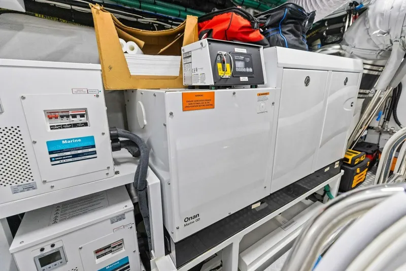 Lady Lion Yacht Photos Pics Engine room of 2023 Princess X95 yacht with Onan Marine generator.