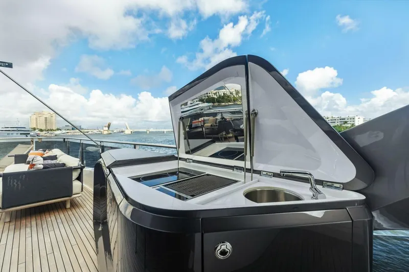 Lady Lion Yacht Photos Pics Luxury outdoor kitchen on 2023 Princess X95 yacht, featuring sleek design and ocean view.