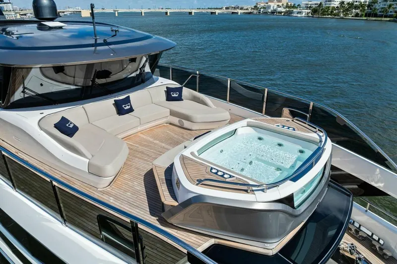 Lady Lion Yacht Photos Pics Luxurious 2023 Princess X95 yacht with jacuzzi and spacious deck seating.