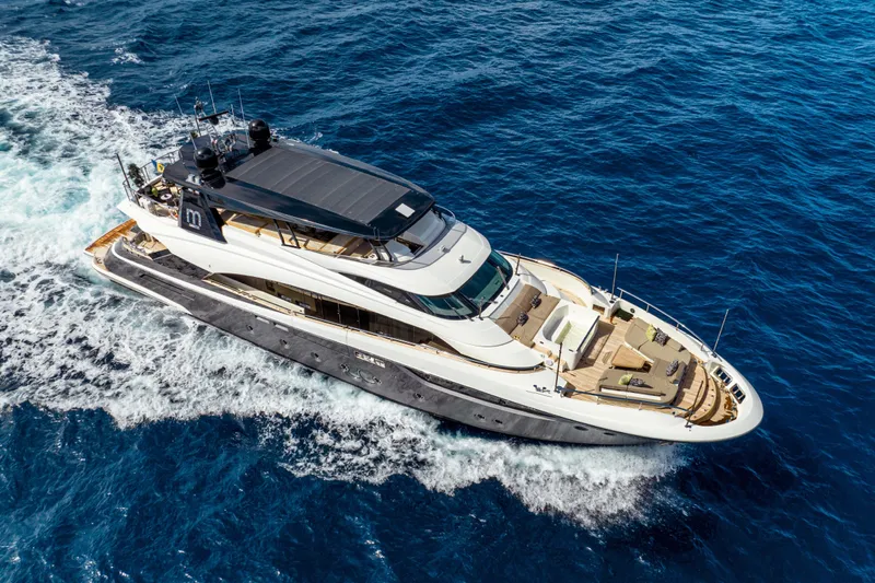 M Yacht Photos Pics Luxurious 2017 Monte Carlo 105 FLY yacht cruising on open blue sea.