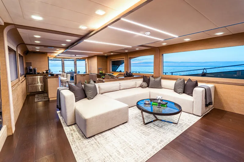 M Yacht Photos Pics Luxurious interior of 2017 Monte Carlo 105 FLY yacht with elegant seating and ocean view.