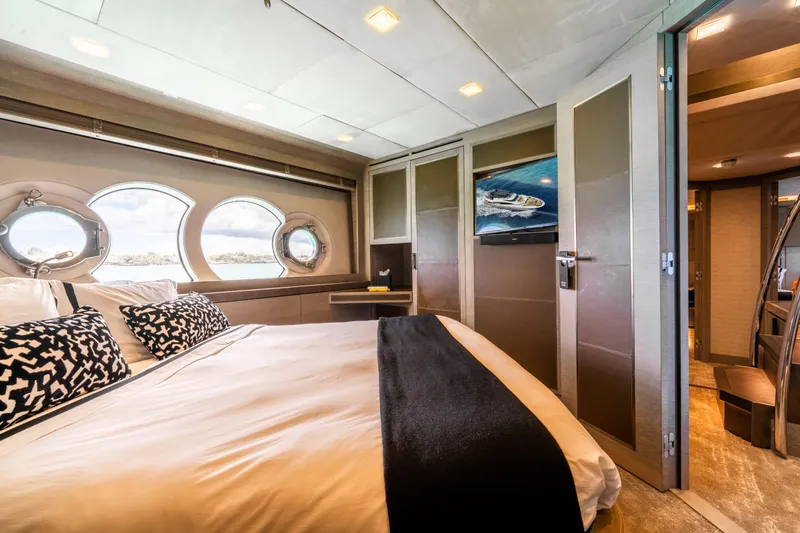 M Yacht Photos Pics Luxurious bedroom interior of 2017 Monte Carlo 105 FLY yacht with elegant decor.