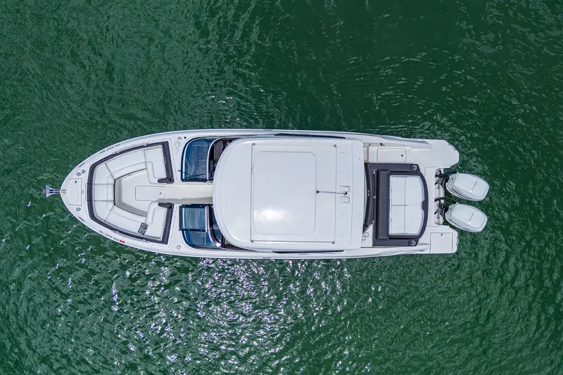  Yacht Photos Pics Aerial view of a 2017 Sea Ray 31 SLX boat on water.