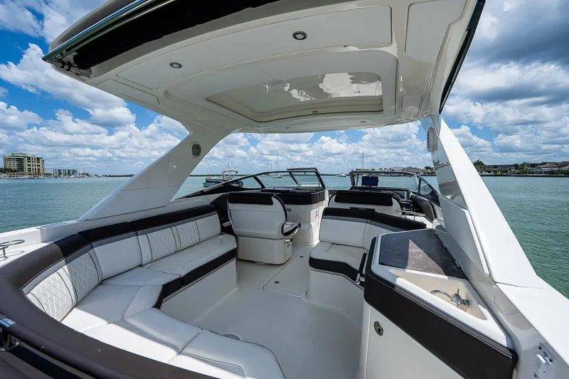  Yacht Photos Pics 2017 Sea Ray 31 SLX boat interior with spacious seating and scenic water view.