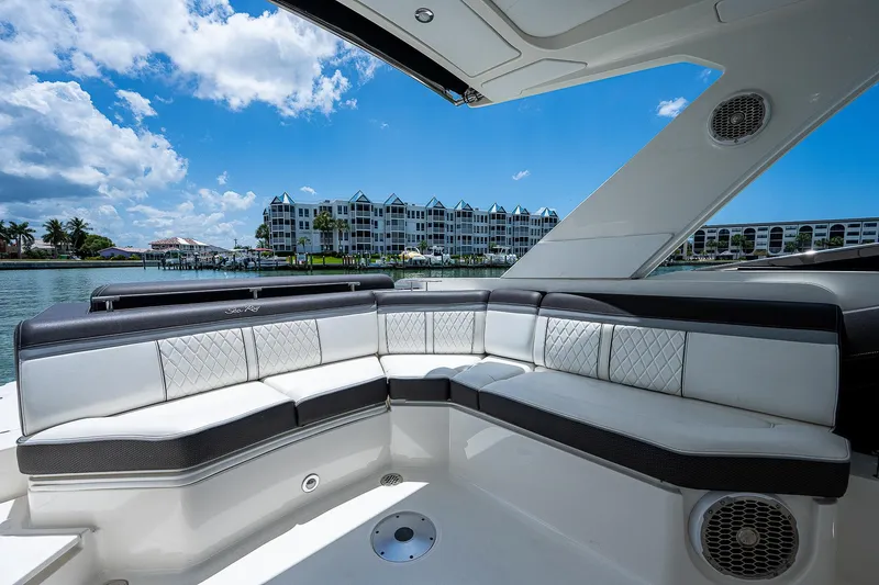  Yacht Photos Pics Luxurious seating area on a 2017 Sea Ray 31 SLX boat with waterfront view.