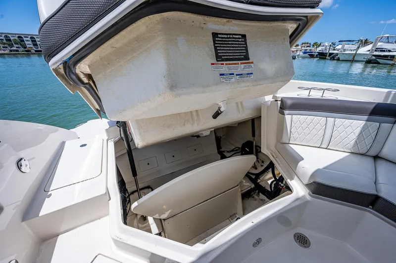  Yacht Photos Pics 2017 Sea Ray 31 SLX boat with open storage compartment.
