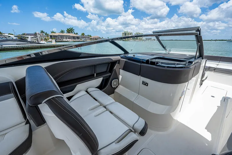  Yacht Photos Pics 2017 Sea Ray 31 SLX boat interior with luxurious seating and waterfront view.