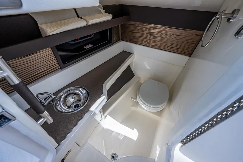  Yacht Photos Pics 2017 Sea Ray 31 SLX boat interior bathroom with sink and toilet.
