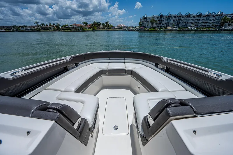  Yacht Photos Pics 2017 Sea Ray 31 SLX boat with spacious seating on calm water.