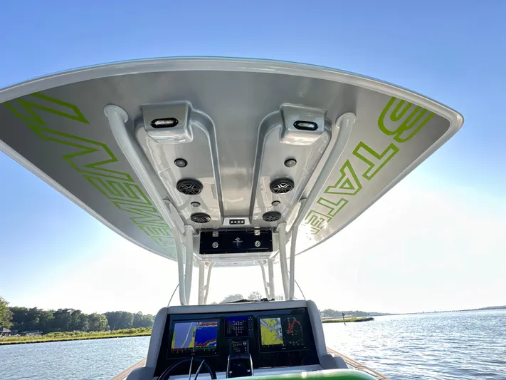  Yacht Photos Pics 2023 Statement 350 Open boat console with advanced navigation systems and sleek design.