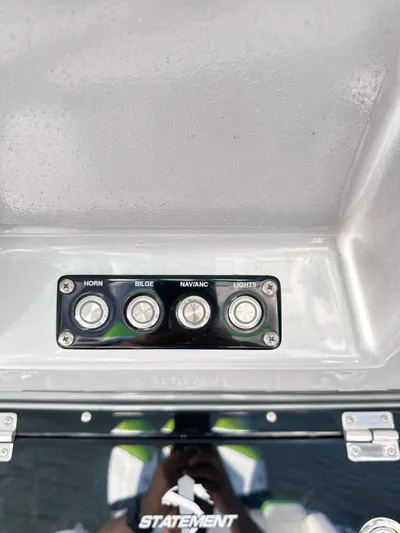  Yacht Photos Pics Control panel of 2023 Statement 350 Open boat with labeled buttons.
