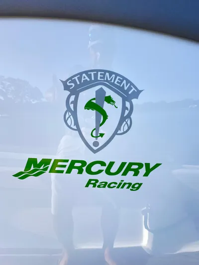  Yacht Photos Pics Statement 350 Open 2023 boat with Mercury Racing logo on white surface.