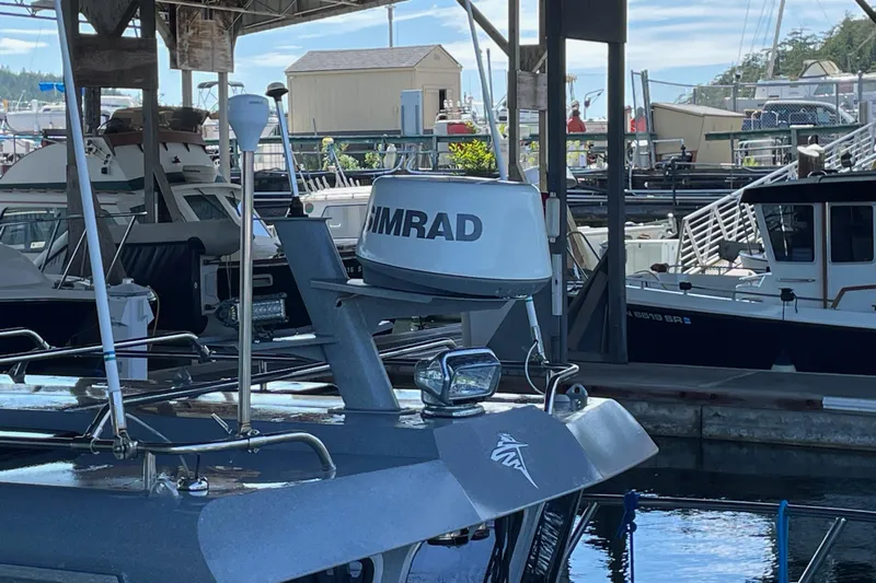  Yacht Photos Pics 2017 KingFisher 2825 Offshore boat docked, featuring Simrad radar equipment.