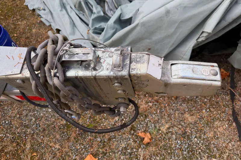  Yacht Photos Pics Trailer hitch of a 2017 KingFisher 2825 Offshore boat, with chains and wiring.