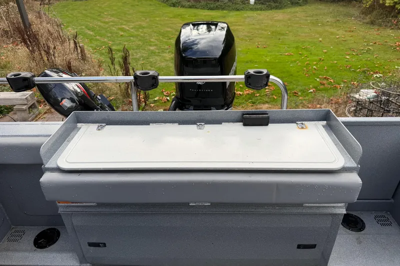  Yacht Photos Pics 2017 KingFisher 2825 Offshore boat with outboard motor and fishing rod holders.