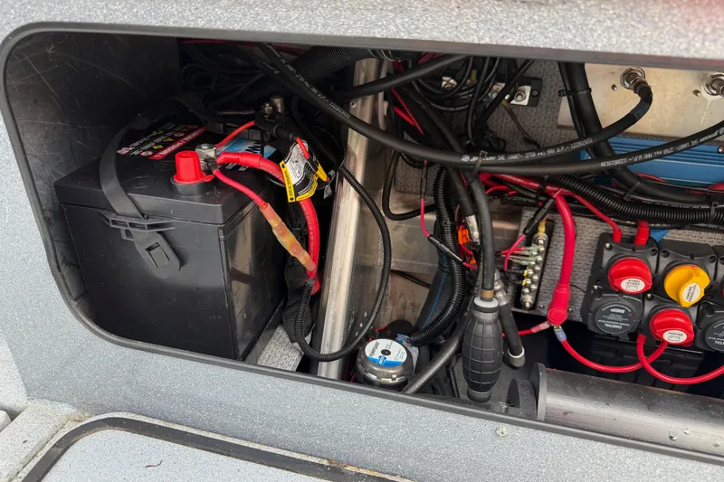 Yacht Photos Pics Battery compartment of 2017 KingFisher 2825 Offshore boat with wiring and switches.