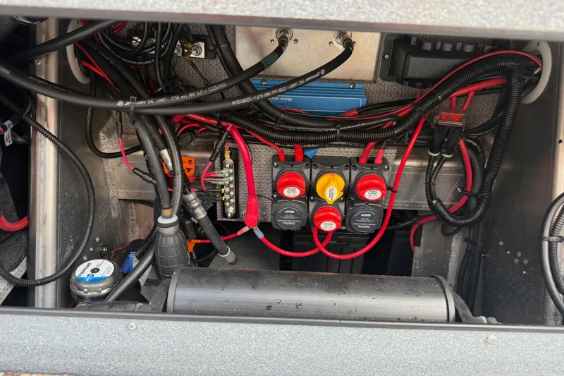  Yacht Photos Pics Electrical system of a 2017 KingFisher 2825 Offshore boat, featuring wiring and switches.