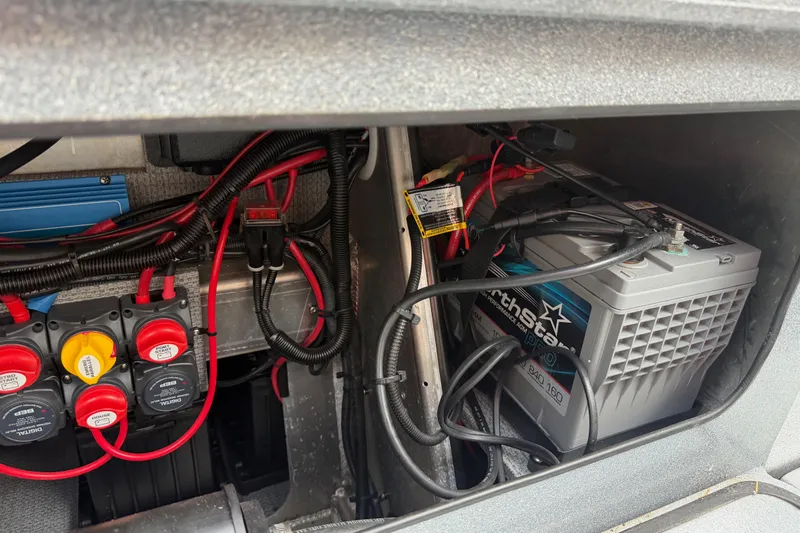  Yacht Photos Pics Battery compartment of a 2017 KingFisher 2825 Offshore boat with wiring and connections.