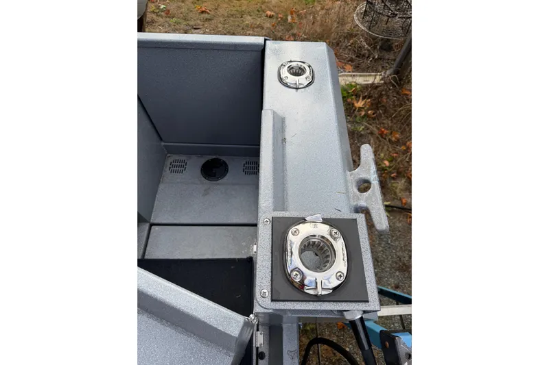  Yacht Photos Pics 2017 KingFisher 2825 Offshore boat deck with metal fittings and storage compartment.