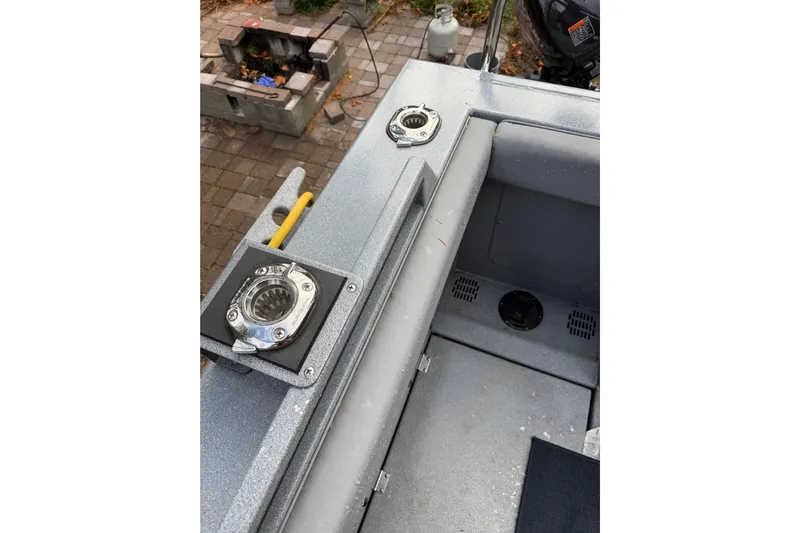  Yacht Photos Pics 2017 KingFisher 2825 Offshore boat deck with rod holders and storage compartments.