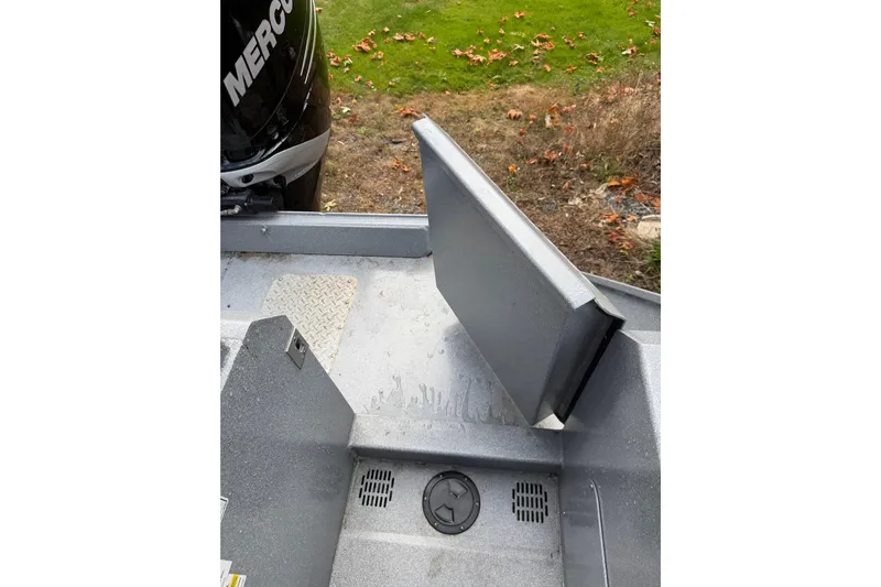  Yacht Photos Pics 2017 KingFisher 2825 Offshore boat interior with Mercury engine, showing seating and deck details.