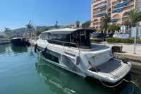 2019 Cranchi T36 Crossover yacht docked in a sunny marina setting.