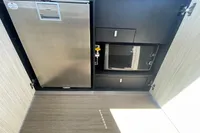 2019 Cranchi T36 Crossover kitchen with stainless steel appliances and modern cabinetry.