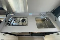 2019 Cranchi T36 Crossover kitchen with stove and sink.
