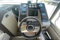 2019 Cranchi T36 Crossover helm with modern controls and navigation display.