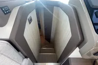 Staircase inside 2019 Cranchi T36 Crossover yacht, featuring modern design and wood accents.