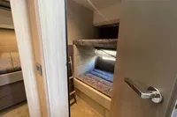 2019 Cranchi T36 Crossover interior with cozy bunk beds and modern design.