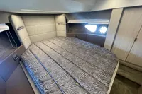 Luxurious cabin interior of 2019 Cranchi T36 Crossover yacht with elegant bedding.