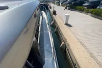 2019 Cranchi T36 Crossover yacht docked at marina, side view.