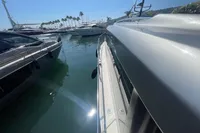 2019 Cranchi T36 Crossover yacht docked in a sunny marina.