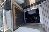2019 Cranchi T36 Crossover engine compartment with open hatch, showcasing interior details.