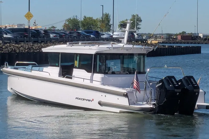 Nocellara De Belice Yacht Photos Pics 2024 Axopar 37 Cross Cabin boat with bench seat and V10 engines on water.