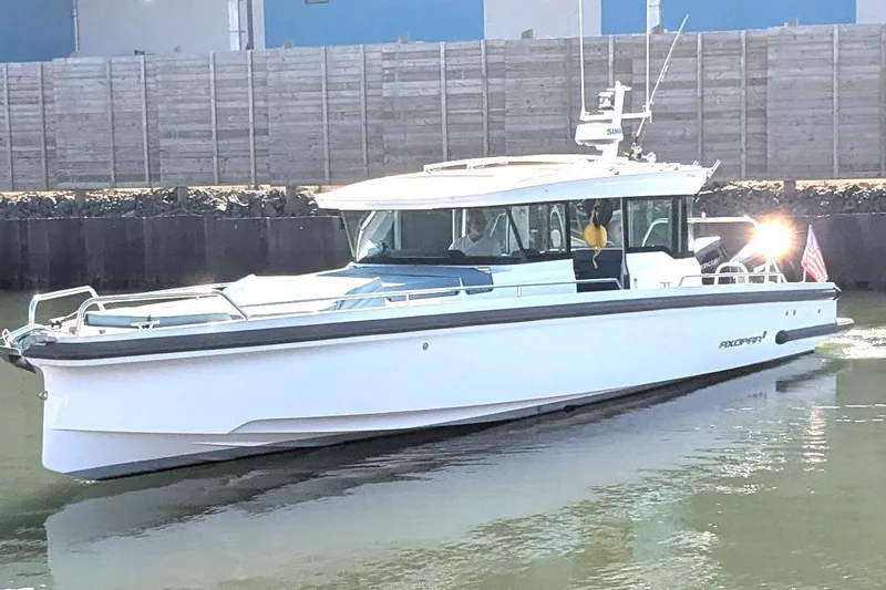 Nocellara De Belice Yacht Photos Pics 2024 Axopar 37 Cross Cabin with Bench Seat, V10s cruising on water.