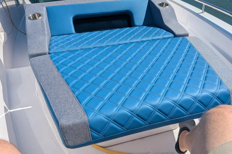 Nocellara De Belice Yacht Photos Pics 2024 Axopar 37 Cross Cabin with blue quilted bench seat and cup holders.