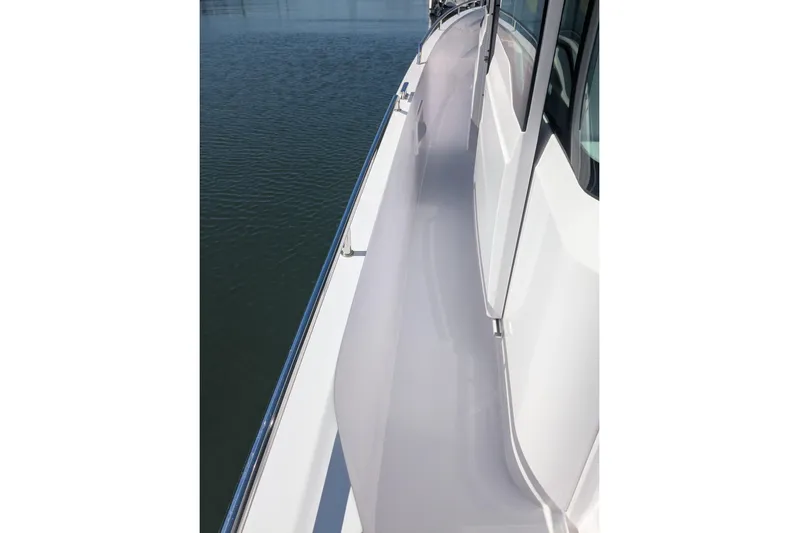 Nocellara De Belice Yacht Photos Pics 2024 Axopar 37 Cross Cabin boat deck, sleek design, side view on water.