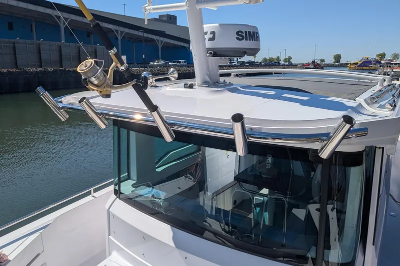 Nocellara De Belice Yacht Photos Pics 2024 Axopar 37 Cross Cabin with Bench Seat, V10s, featuring fishing rod holders.