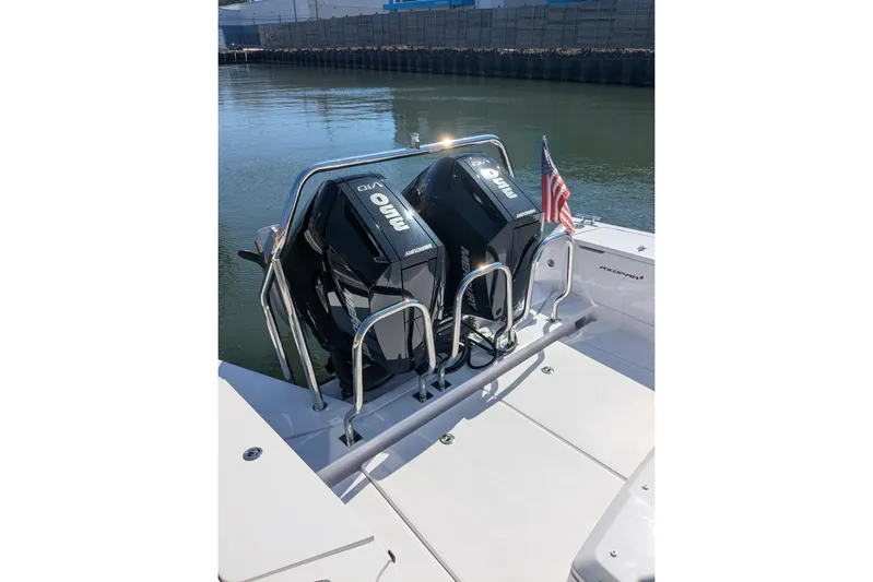 Nocellara De Belice Yacht Photos Pics 2024 Axopar 37 Cross Cabin with V10 engines, docked by the water.