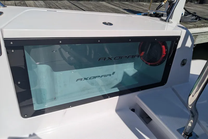 Nocellara De Belice Yacht Photos Pics 2024 Axopar 37 Cross Cabin with Bench Seat, V10s, featuring sleek design details.