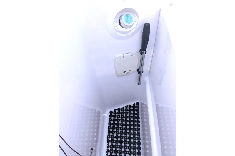 Nocellara De Belice Yacht Photos Pics Interior view of 2024 Axopar 37 Cross Cabin, featuring a bench seat and V10s.