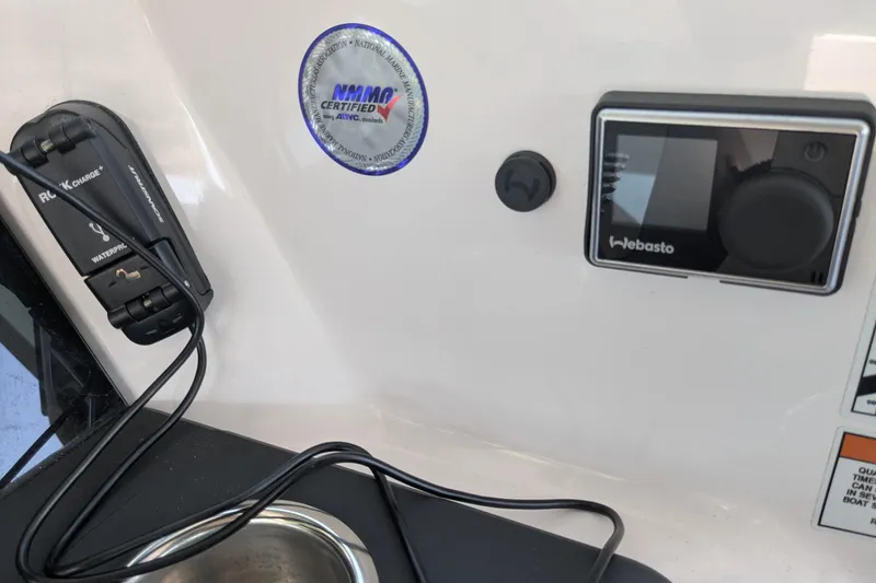 Nocellara De Belice Yacht Photos Pics Control panel of 2024 Axopar 37 Cross Cabin with Bench Seat, featuring Webasto system.