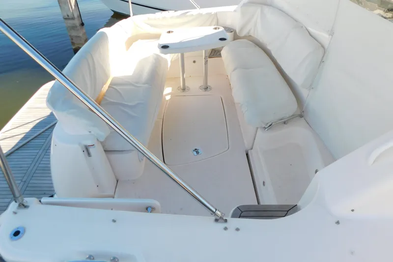  Yacht Photos Pics 2009 Tiara Yachts 4300 Sovran cockpit with white seating and table.