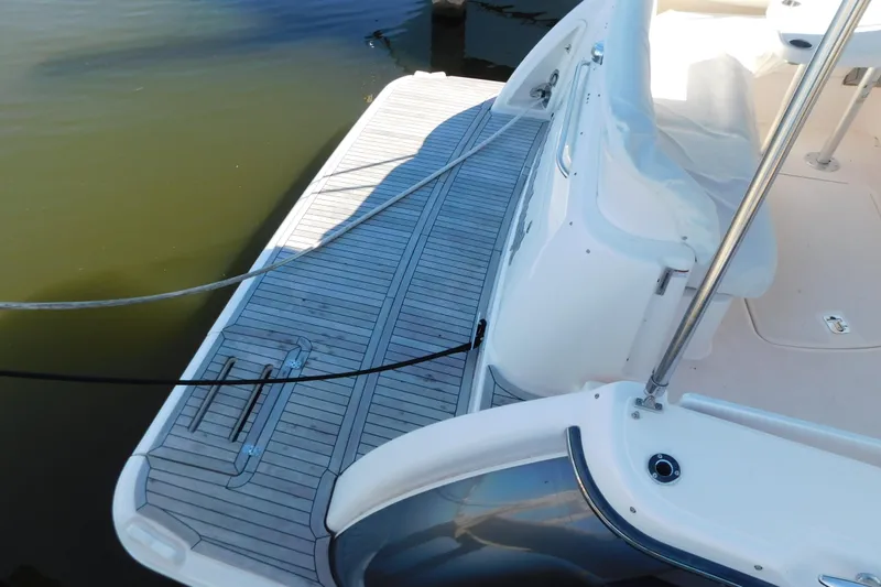  Yacht Photos Pics 2009 Tiara Yachts 4300 Sovran swim platform with teak decking and stainless steel railing.